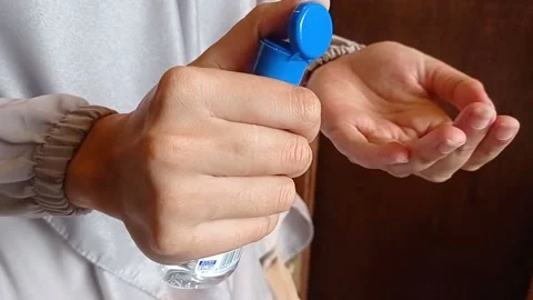 Use a hand sanitizer to make sure it's always clean Stock Footage 137695590