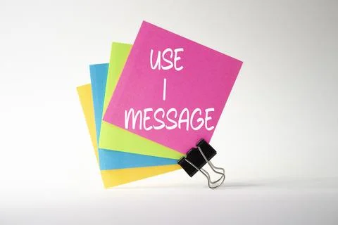 Use I message symbol. Pink sticky note with paper clips with words Use I me.. Stock Photos