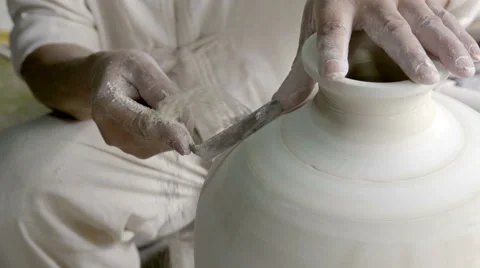 Use a knife handmade ceramics, shaping a ceramics 動画素材 66064269