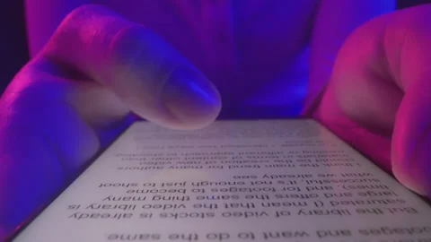 Use of mobile phone in shining neon light. Creative vivid color of ultraviolet r Stock Footage 199483045