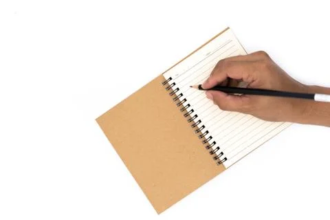 Use a pencil to write on the book. Stock Photos