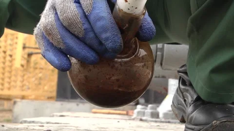 Use of a sampler for petroleum products. Stock Footage 103624834