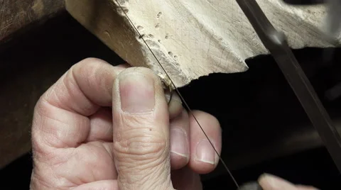Use a saw wire on a gold ring: goldsmith at work Video stock 51248548