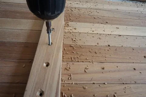 Use screw machine for insert screw into the wood Stock Photos