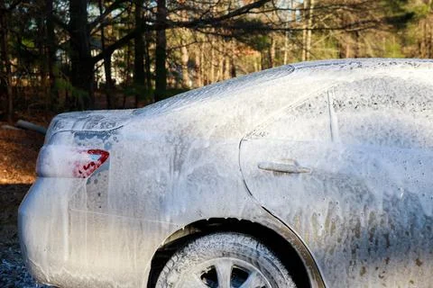 The use soap dispenser will make your car cleaner. Stock Photos