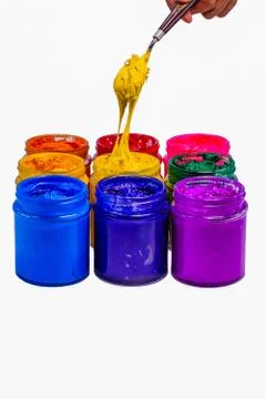 Use trowel scoop yellow color from the can. Stock Photos