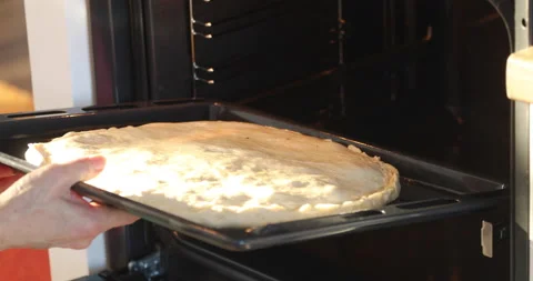 Use video  The cake is put into the oven Stock Footage 149312344