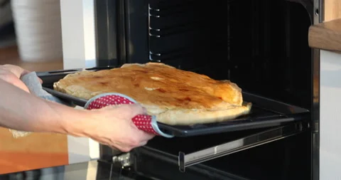 Use video  The cake is put into the oven Stock Footage 149312372