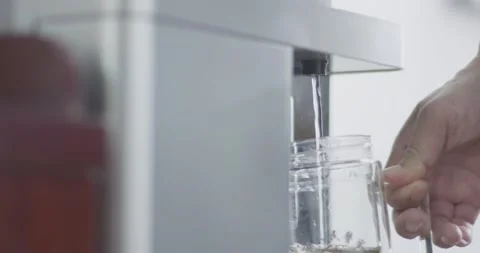 Use the water dispenser to make tea Stock Footage 172096308