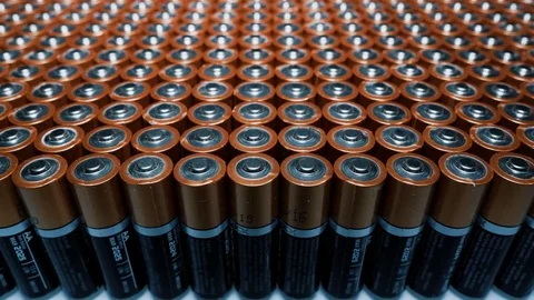 Used Alkaline batteries. Conceptual Background of Environmental Pollution or Stock Footage 77361866