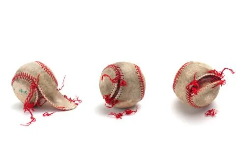 Used baseball, on white background, various ripped and torn stages Foto stock