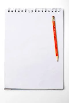 Used blank note book with ring binder and old pencil, isolated on white Stock Photos