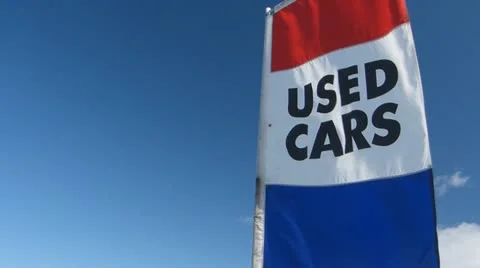 Used Car Flag Advertising Sign At A Car Dealer Canada Stock Footage