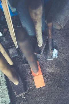 Used carpentry hammers on the floor Stock Photos