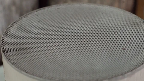 Used ceramic catalyst converter close-up Vídeos de archivo 121505631