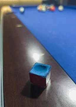 Used chalk cube placed over rail 库存照片