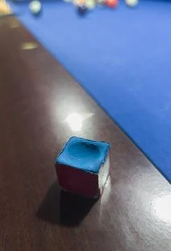 Used chalk cube placed over rail Stockfoto's