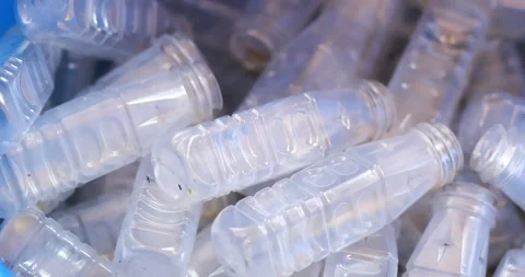 Used clear PET plastic bottles in a recycling bin. plastic waste management.. Stock Footage 341089130