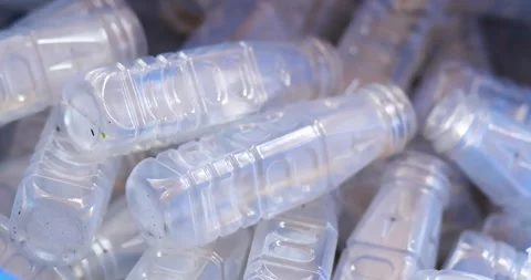 Used clear PET plastic bottles in a recycling bin. plastic waste management.. Stock Footage 341557801