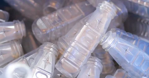 Used clear PET plastic bottles in a recycling bin. plastic waste management.. Stock Footage 341923868