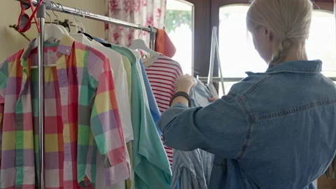 Used clothes resale concept. Stock Footage 221543626