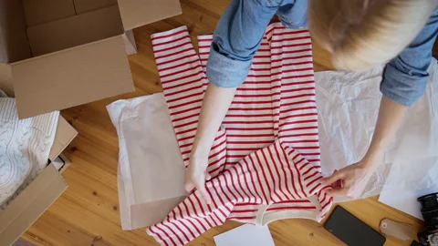 Used clothes resale concept. Stock Footage 221555059