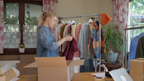 Used clothes resale concept. Stock Footage 221561929