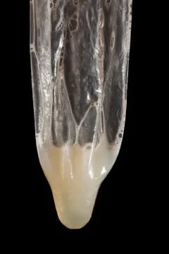 Used condom with sperm Stock Photos