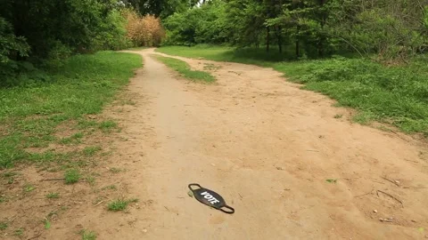 Used Covid Mask on the Ground Video stock 152183230