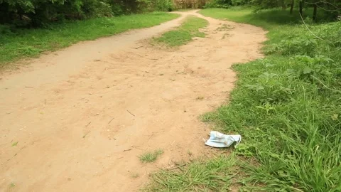 Used Covid Mask on the Ground Video stock 152183242