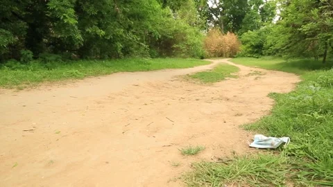 Used Covid Mask on the Ground Video stock 152183243