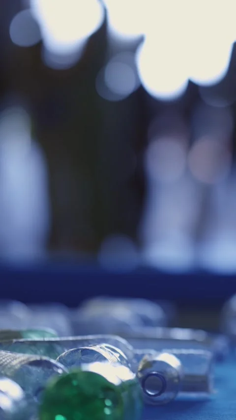Used empty bottles - a many people on background Stock Footage 330158171