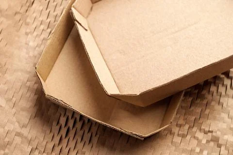 Used empty cardboard boxes and wrapping soft paper. Recycling materials.  Stock Photos
