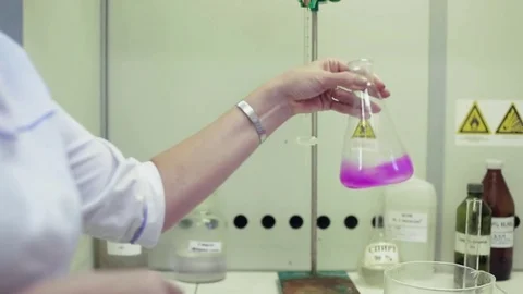 Used Erlenmeyer flask for filtration in modern laboratory Stock Footage 83443305