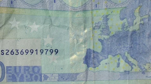 Used Euro notes on a white background. Closeup slide action shot. Video stock 72225941
