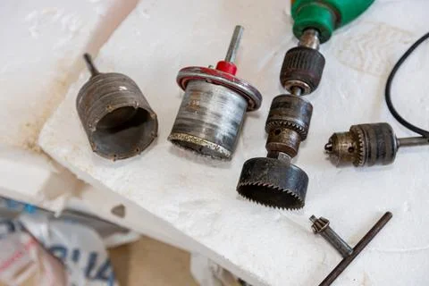 Used few inserts of various drilling diameters, saw drill Stock Photos