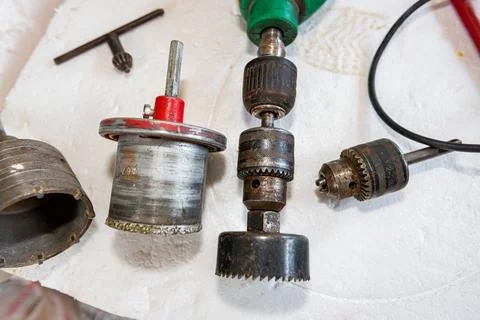 Used few inserts of various drilling diameters, saw drill Stock Photos