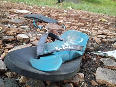 Used flip flops Foto stock