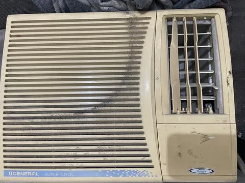 Used General Super Cool Window Air Conditioner Stock Photos