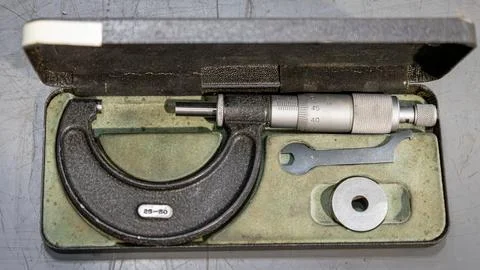 A used micrometer in its storage box Stock Photos