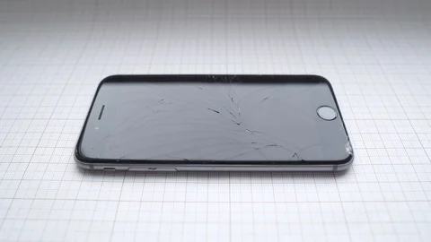 Used modern smartphone, cracks on the screen, gadget repair required Stock Footage 118579613