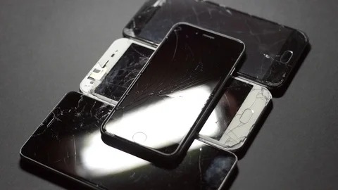 Used modern smartphone, cracks on the screen, gadget repair required Stock Footage 118580178