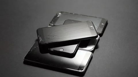 Used modern smartphone, cracks on the screen, gadget repair required Stock Footage 118580334