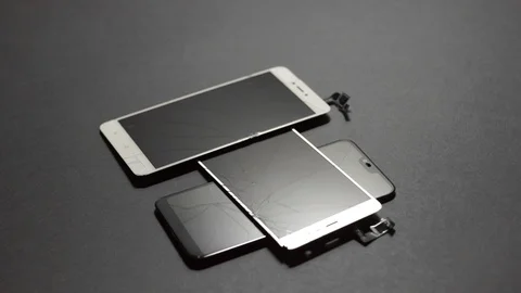 Used modern smartphone, cracks on the screen, gadget repair required Stock Footage 118580419