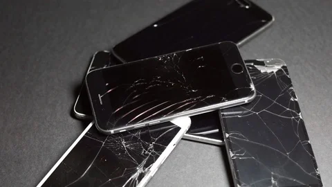 Used modern smartphone, cracks on the screen, gadget repair required Stock Footage 118580454