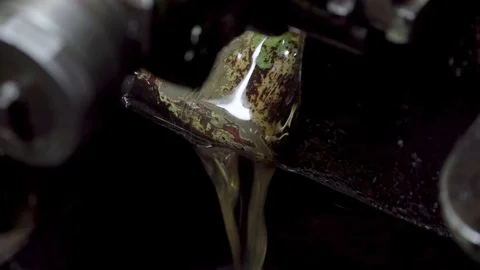 Used oil runs on a rusty machine at the factory. Stock Footage 116808586