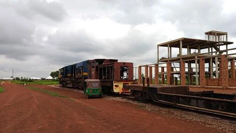 Used old train and bricks house under construction at Red clay studio in Ghan Stock Photos