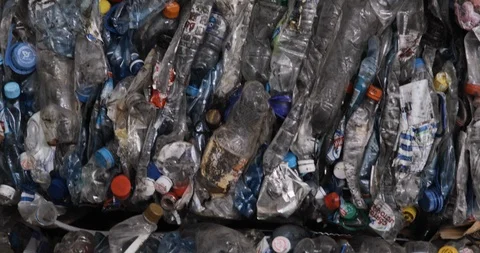 Used plastic bottles at garbage recycling processing factory for reuse plastic. Stock Footage 120123039
