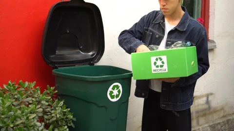 Used plastic  bottles recycle bin. Recycling symbol Stock Footage 119190889