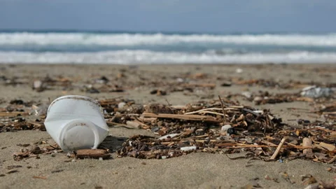 Used Plastic cup and microplastic on sea ecosystem,pollution contamination Stock Footage 218348326